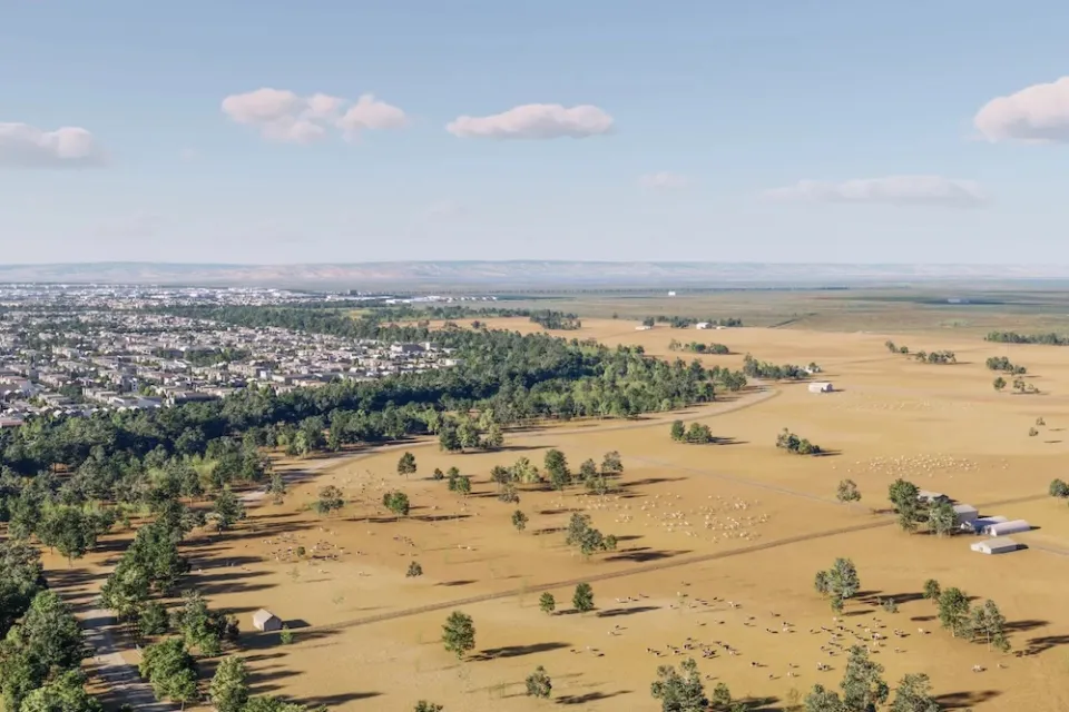 Rendering of aerial view of greenbelt separating farmland and residential area for California Forever development.